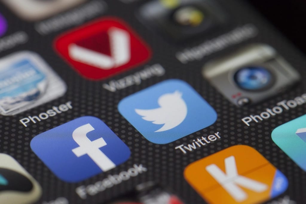 Messaging and social apps on a phone screen