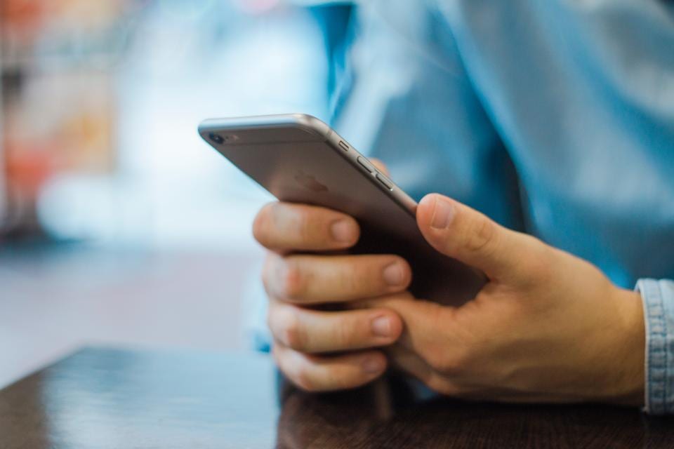 A person holding a smartphone